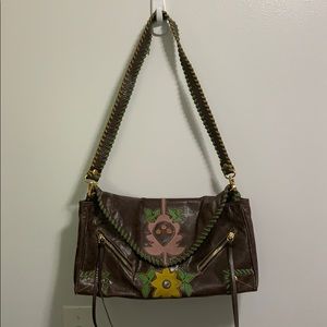 Loop NYC clutch. Brown w/ birds